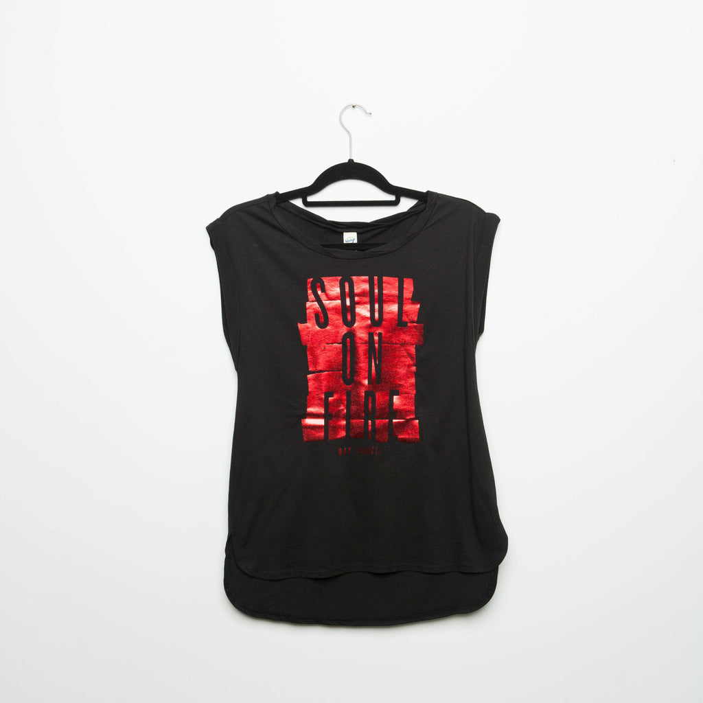 A black Mac Powell ladies t-shirt with a shiny red design that reads "Soul of Fire".
